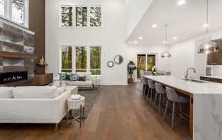 Kitchen and dining room with wooden floors and white walls Cleaning walls after painting