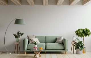 White living room with olive green sofa painting a room tips
