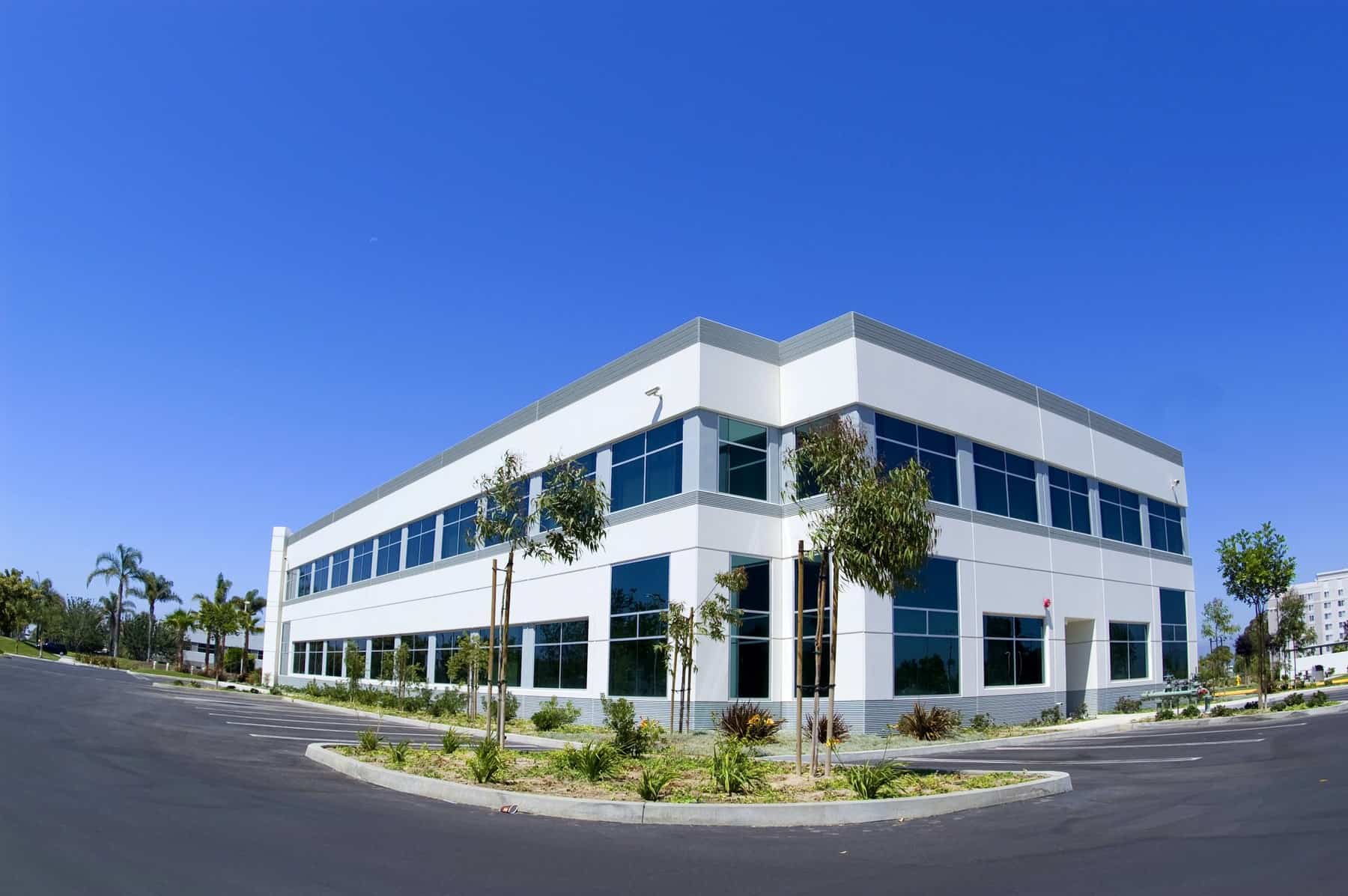 White commercial building with grey accent colors