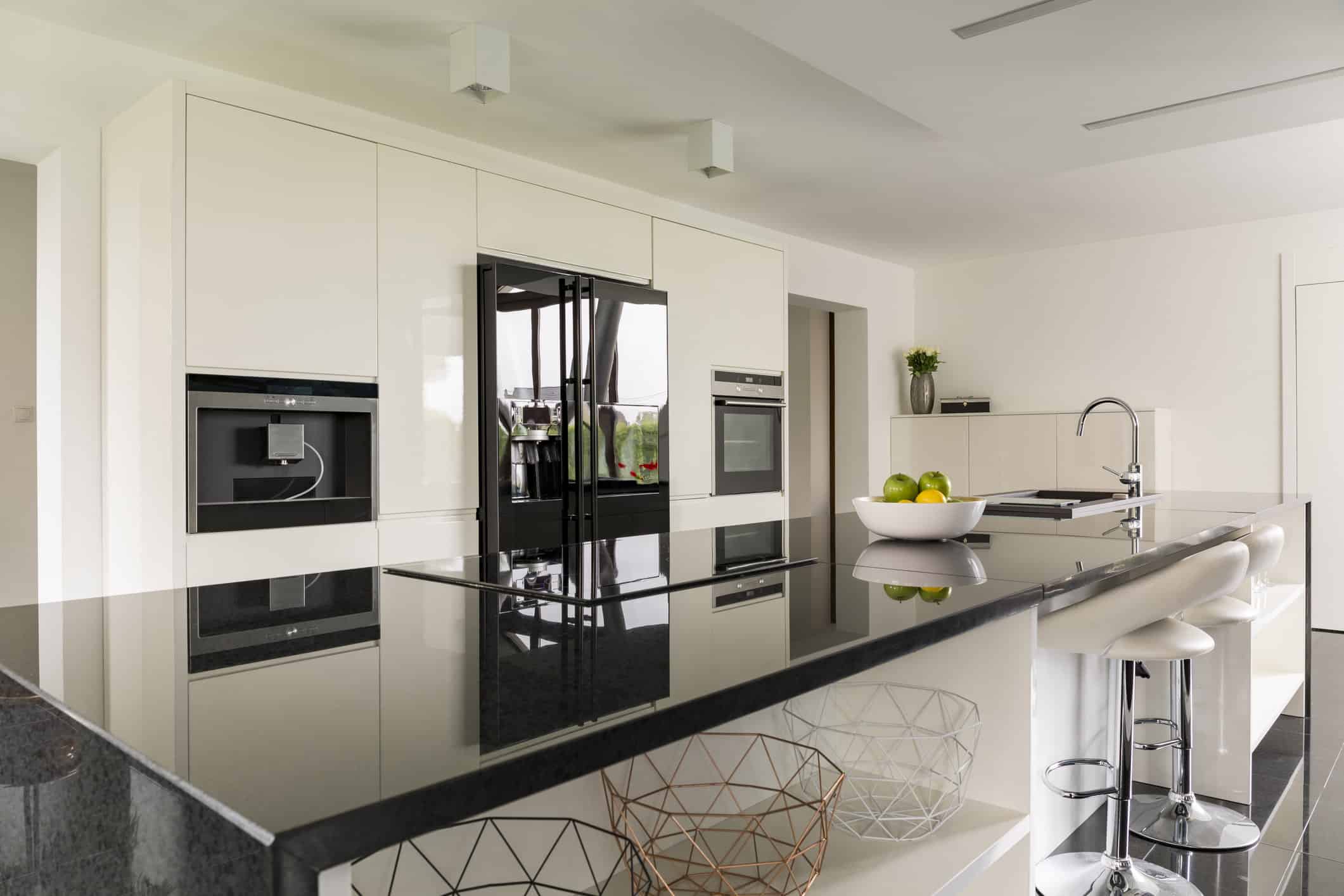 Kitchen island with marble wotktop in luxurious interior