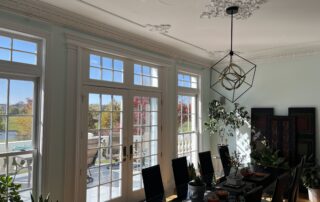 Modern dining room used appropriate interior paint color for sunlit rooms