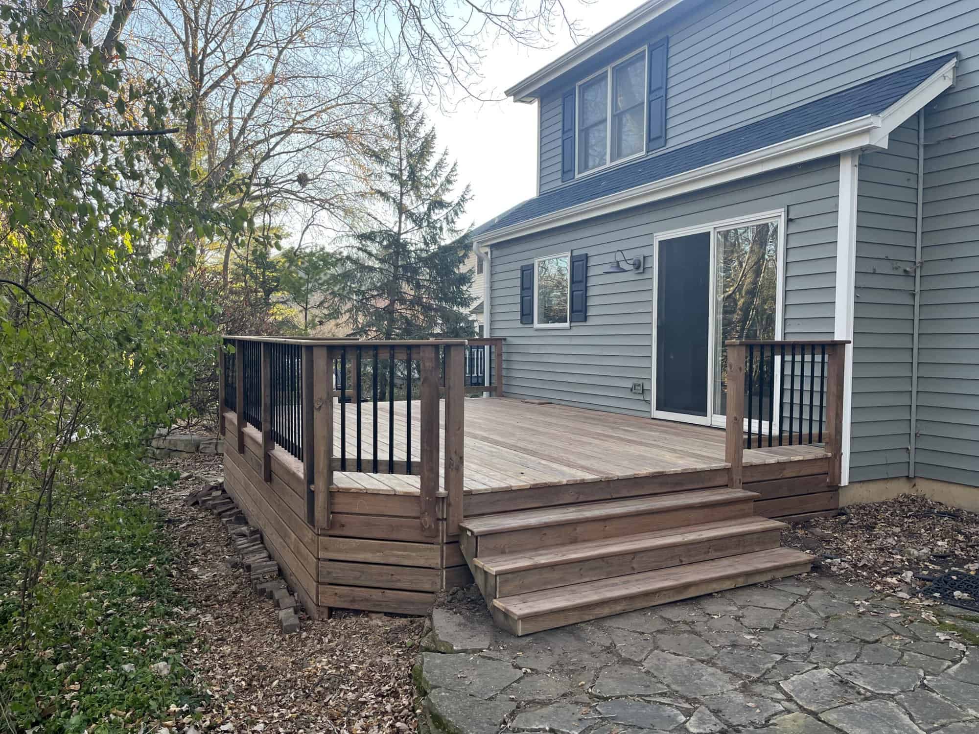 Wooden deck with glass sliding door